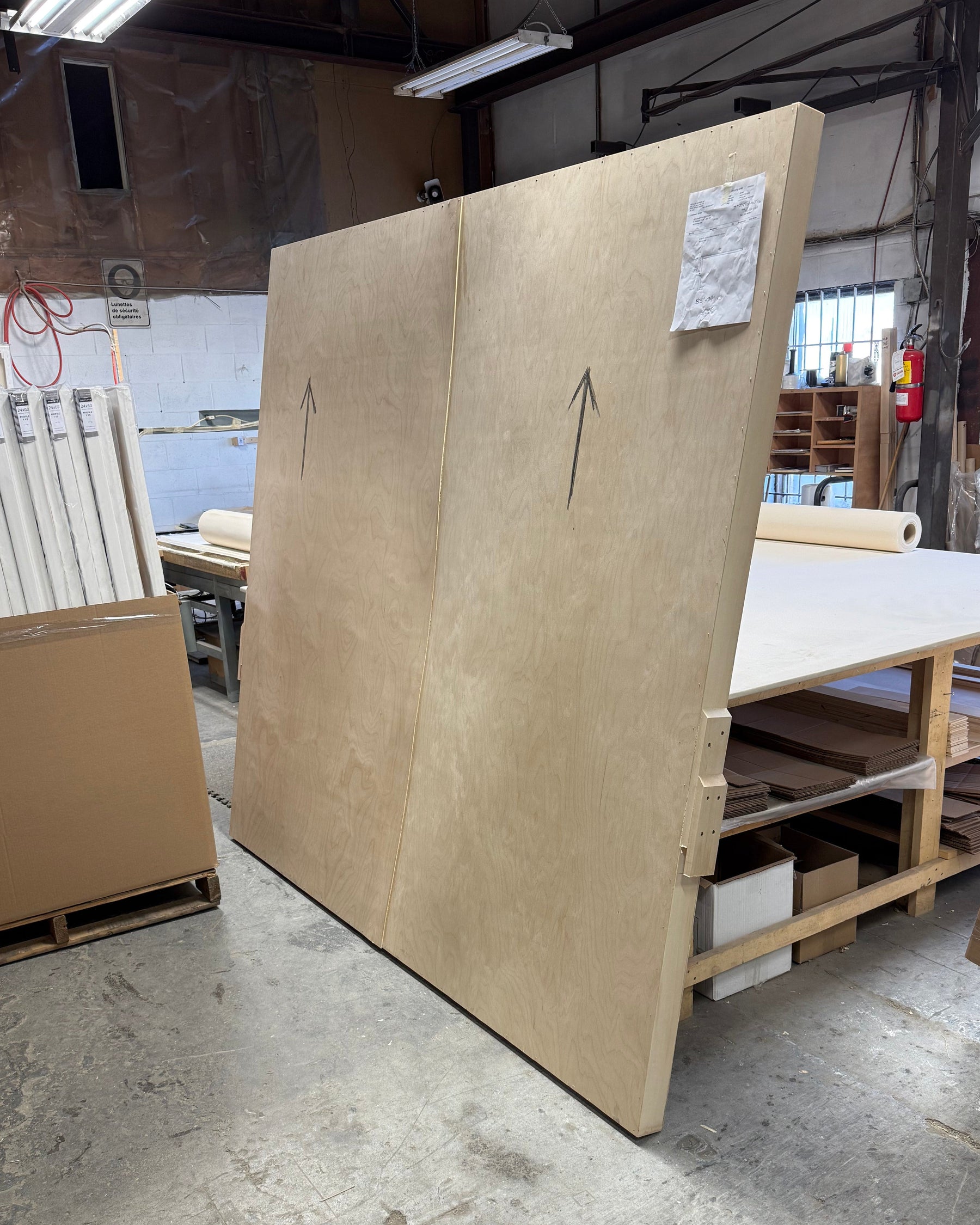 Large wooden crate for shipping large canvases/wood panels in the Apollon workshop.